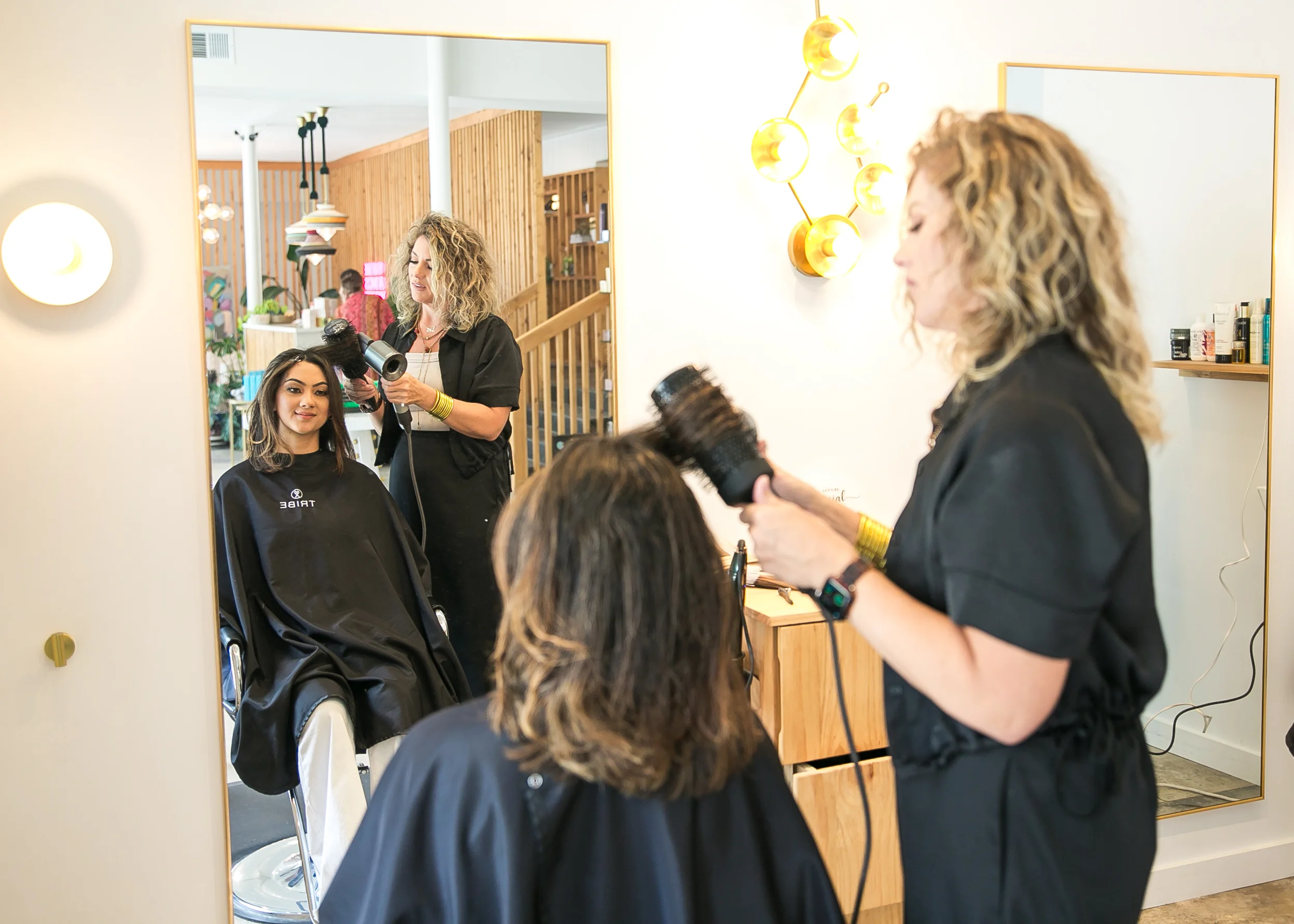 A stylist creates a polished salon finish